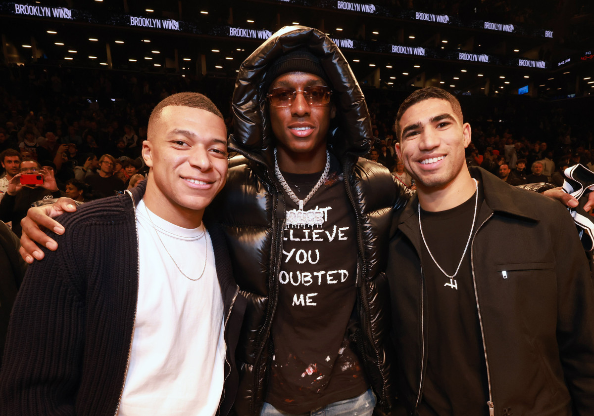 Sauce Gardner with soccer stars Kylian Mbappé and Achraf Hakimi.